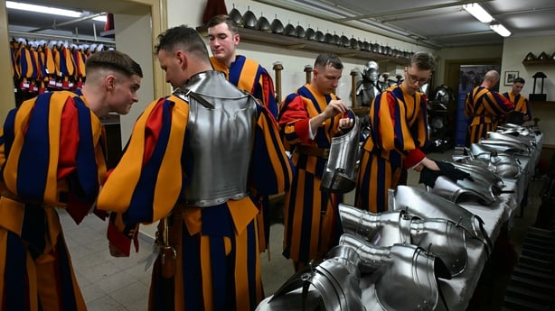 Swiss Guards get ready in the Vatican Armory at the Pontifical Swiss Guard headquarters, prior the swearing-in ceremony