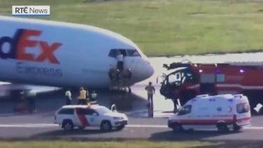 Watch: Pilots exit cockpit after issue with front wheels