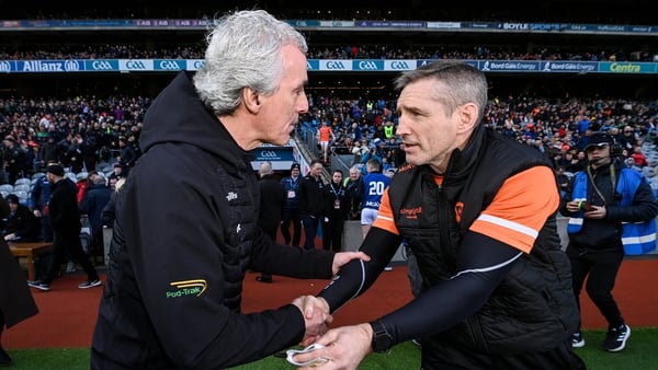 Donegal boss Jim McGuinness (L) and Armagh manager Kieran McGeeney go head-to-head this Sunday