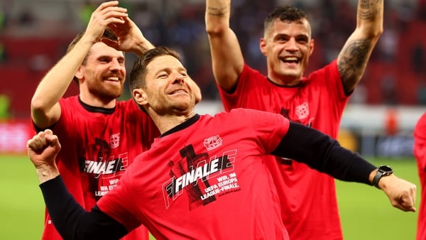 Bayer Leverkusen coach Xabi Alonso celebrates at full-time