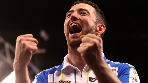 Luke Humphries celebrates his win over Michael Van Gerwen in Leeds