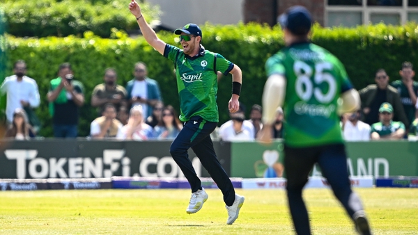 Mark Adair of Ireland celebrates his side taking a first wicket