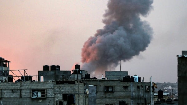 Smoke rises over the city of Rafah following an Israeli airstrike over the weekend