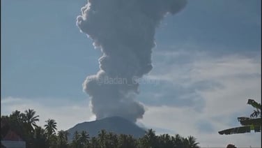 Ash hovers over Indonesia's Mount Ibu after eruption
