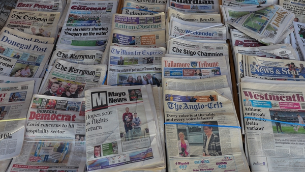 A selection of Irish local newspapers from 2021. Photo: Artur Widak/NurPhoto via Getty Images