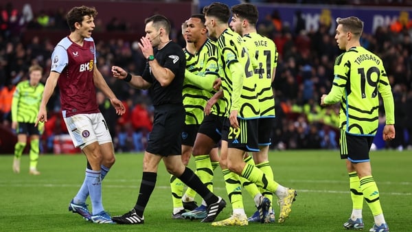 Multiple players haranguing referees is an all too familiar sight in the modern game
