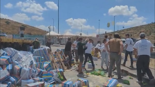 Israeli protesters blocked aid trucks headed for Gaza yesterday