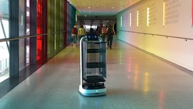 AI robots help Dublin Airport passengers with bags