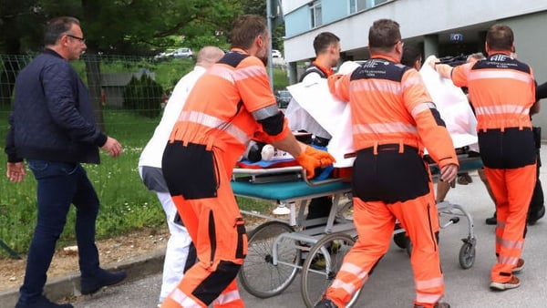 Emergency personnel bring Robert Fico to hospital following the assassination attemp