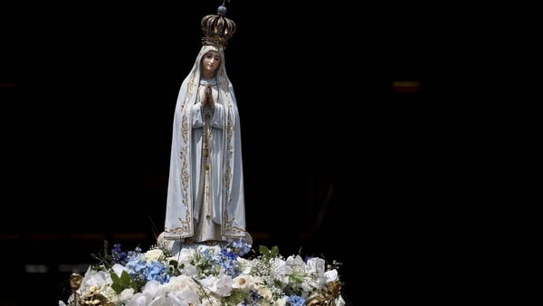 Statue of 'Our Lady of Fatima' is carried during a procession at Fatima shrine, in Portugal, on 13 May