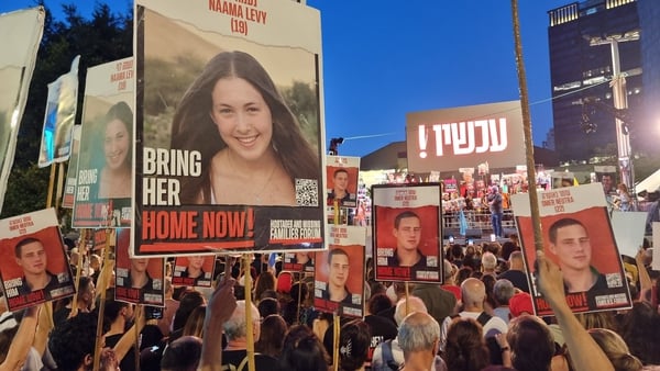 People gather at a 'United We Bring Them Home' rally in Hostages Square on 18 May in Tel Aviv