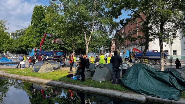 An operation is under way this morning to remove tents from along the Grand Canal