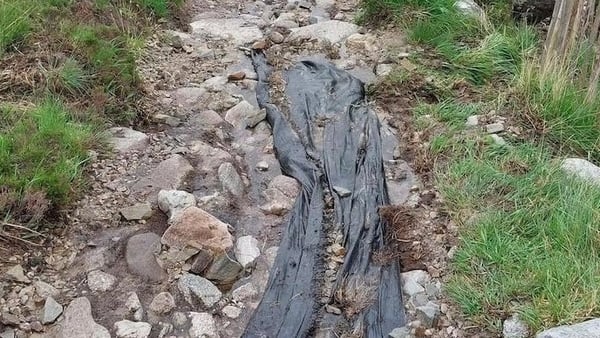 Heavy rain in recent days has displaced many parts of the pathway by shifting large stones which now have to be refitted and replaced