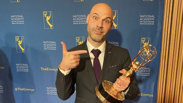 Director Richard Milway celebrates his Emmy Sports documentary award win in New York