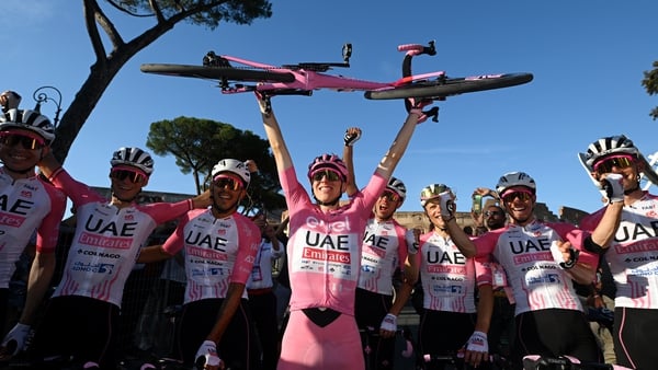 Tadej Pogacar (C) celebrates his Giro triumph