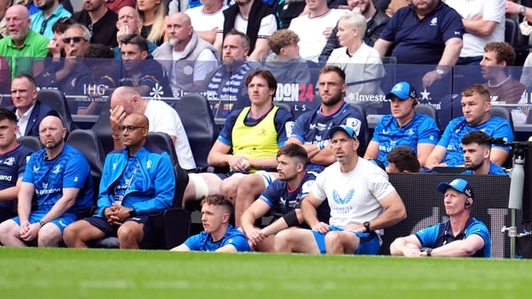 The Leinster coaching staff and players look on at the end of the Champions Cup final