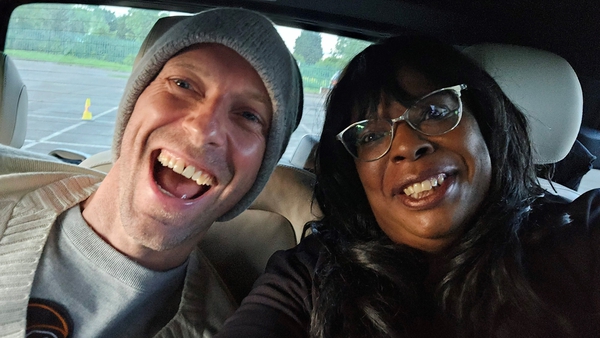 Chris Martin and Saundra Glenn after the Coldplay singer gave her a lift into Radio 1's Big Weekend