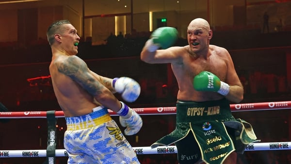 Usyk (L) dealt Fury his first professional defeat