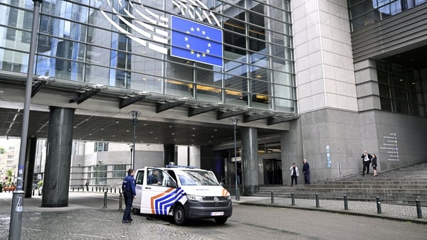 A Belgian police van in front of the European Parliament building