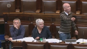 Watch: Dáil suspended after row between minister and TDs