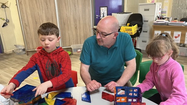 Specialist in autism training Brendan Keiley (c) working with children at the school
