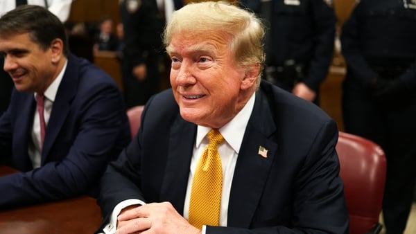 Donald Trump awaits the start of proceedings in his criminal trial at Manhattan Criminal Court in New York City