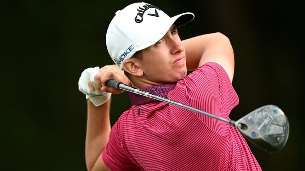 Tom McKibbin of Northern Ireland tees off on the sixth hole