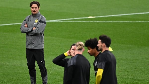 Edin Terzic keeps an eye on his troops in training at Wembley on Friday