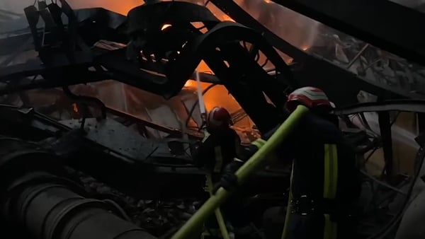 Video shared by Volodymyr Zelensky showed firefighters working to put out flames following the strikes