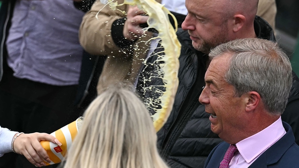 Nigel Farage was hit with what appeared to be a milkshake as left a pub in Clacton