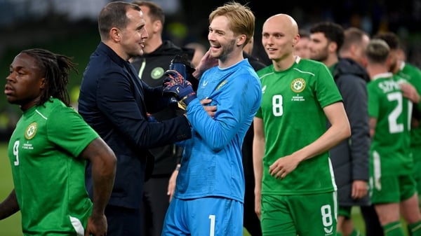 John O'Shea enjoys a moment with goalkeeper Caoimhin Kelleher after the game