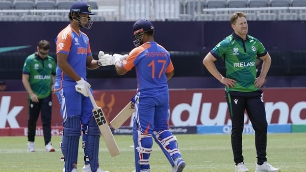 India's Rishabh Pant (C) celebrates his team's win with team-mate Shivam Dube