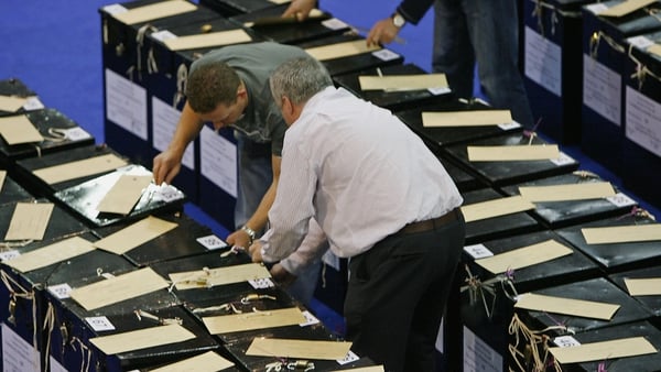 Ballot counters prepare to open ballot boxes at the RDS centre in Dublin, in Ireland, 25 May 2007. Photo: Getty Images