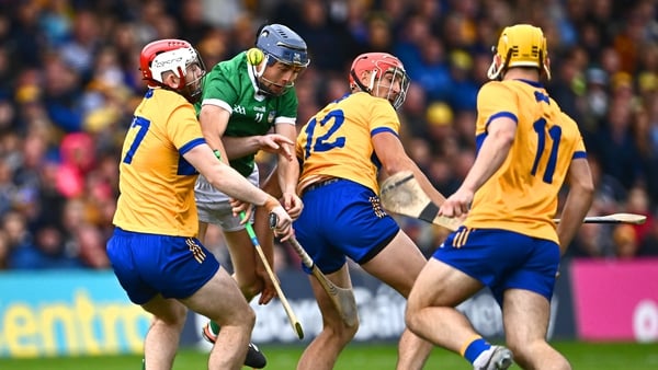 David Reidy of Limerick in action against Clare players, from left, Conor Leen, Peter Duggan and Mark Rodgers