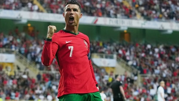 Cristiano Ronaldo celebrates after scoring against Ireland