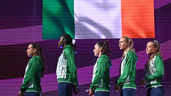 From left, Sophie Becker, Rhasidat Adeleke, Phil Healy, Sharlene Mawdsley and Lauren Cadden stand for the National Anthem at the medal ceremony