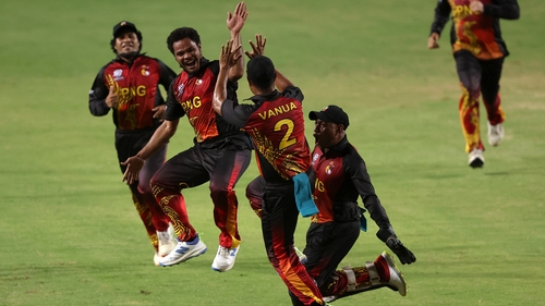 Sema Kamea celebrates a wicket with his Papua New Guinea team-mates, however, they were beaten by Afghanistan