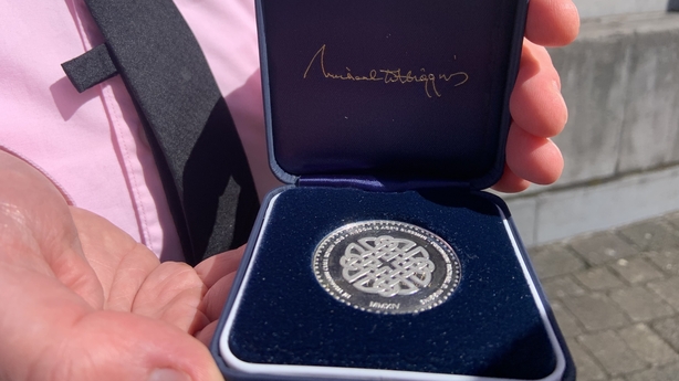A centenary coin shown in evidence in the case A centenary coin shown in evidence in the case