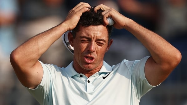 Rory McIlroy reacts after the 18th hole where he made bogey