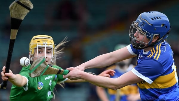 Tipperary's Roisín Howard gets a shot away despite the close attention of Limerick's Stephanie Wolfe in 2022. The two sides clash in Rathkeale today