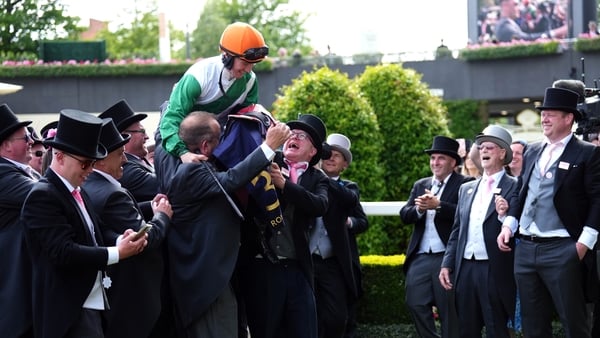 Colin Keane congratulated by the Wear A Pink Ribbon syndicate afterwards