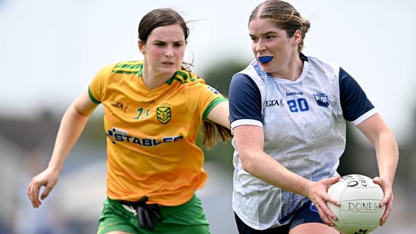 Waterford's Eve Power tries to evade Susanne White of Donegal