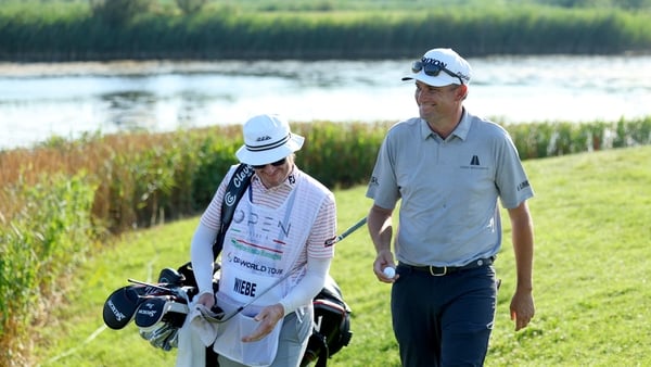 Gunner Wiebe and caddie during the second round in Italy