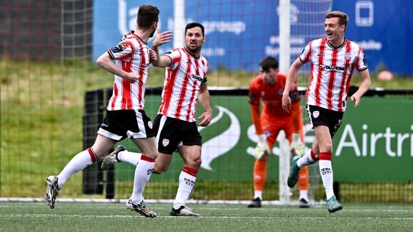 Derry's Cameron Dummigan, left, celebrates with team-mates Patrick Hoban, centre, and Daniel Kelly after scoring their opening goal