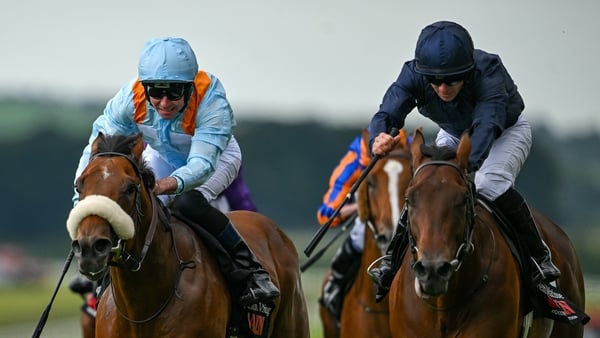 Henri Matisse, with Wayne Lordan up, right, on their way to winning the GAIN Railway Stakes