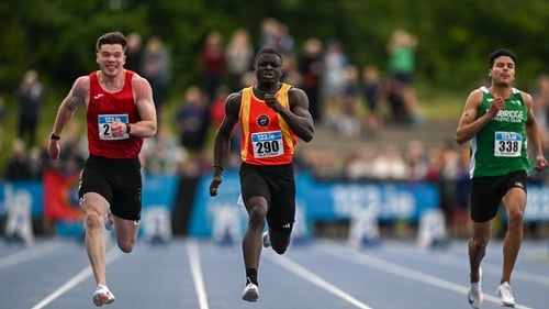 Israel Olatunde, centre, on his way winning the men's 100m