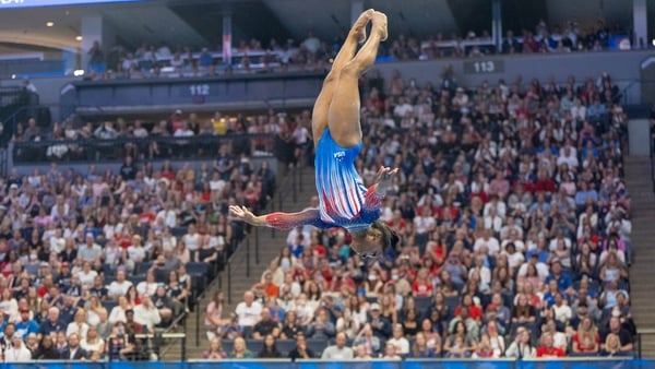 Simone Biles competes in the floor exercise at Target Center in Minneapolis