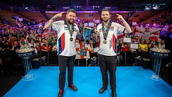 Michael Smith and Luke Humphries celebrate success at the World Cup of Darts