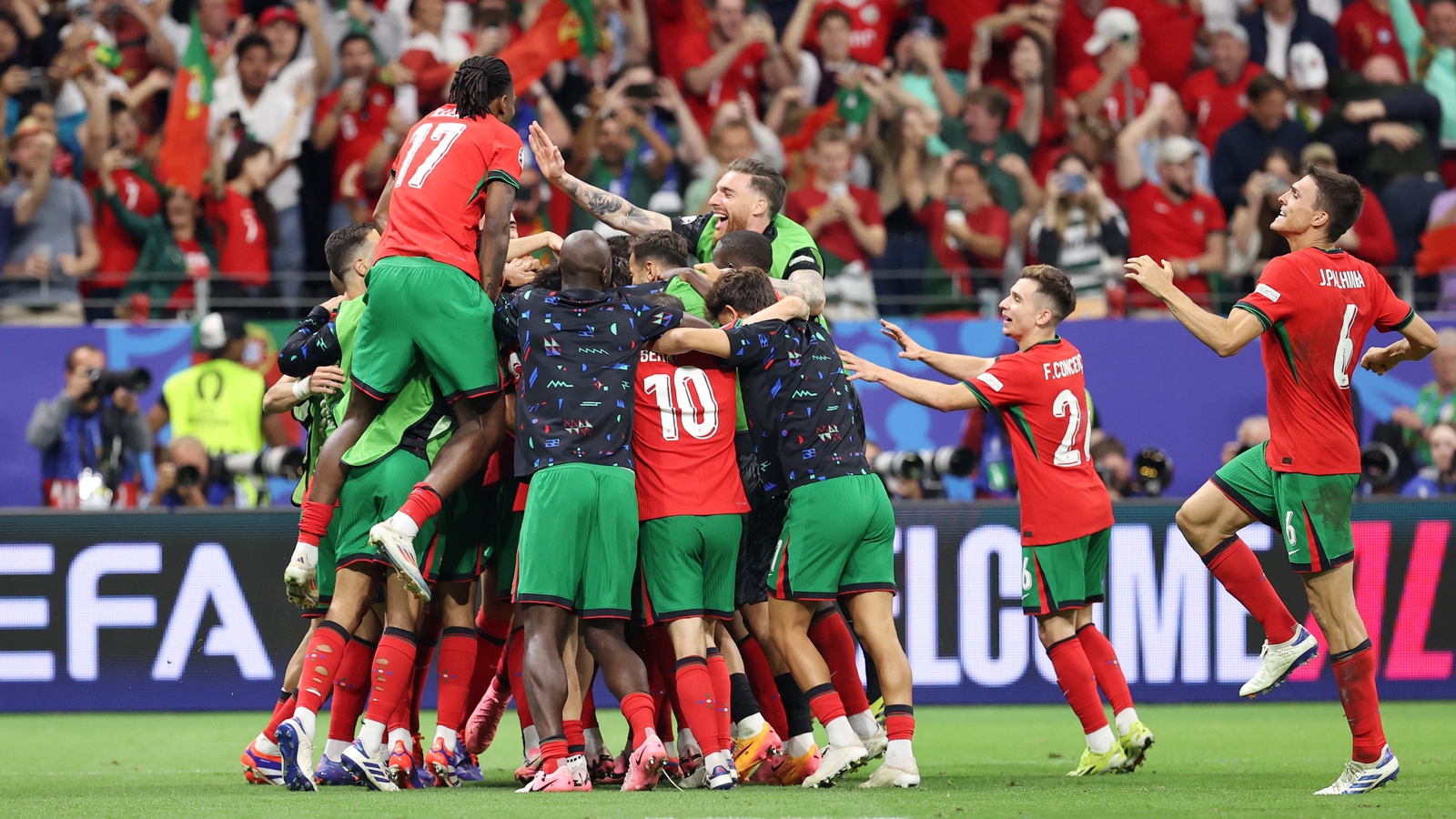 Tears to cheers as Portugal beat Slovenia in shootout