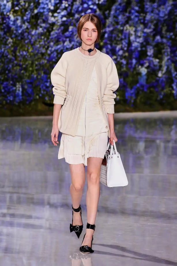 Chunky knitwear with silk frocks have reigned supreme on Dior's S/S runways (Alamy/PA)